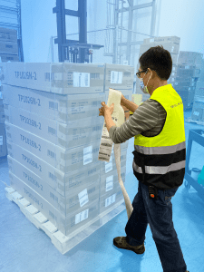 EOS warehouse employee preparing a pallet order for shipping as part of 3PL fulfillment operations