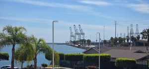 Port of Long Beach visible in the distance from the shoreline near San Pedro, California.