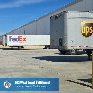 FedEx and UPS trailers at the loading dock of EOS California headquarters for outbound shipping and last-mile delivery.