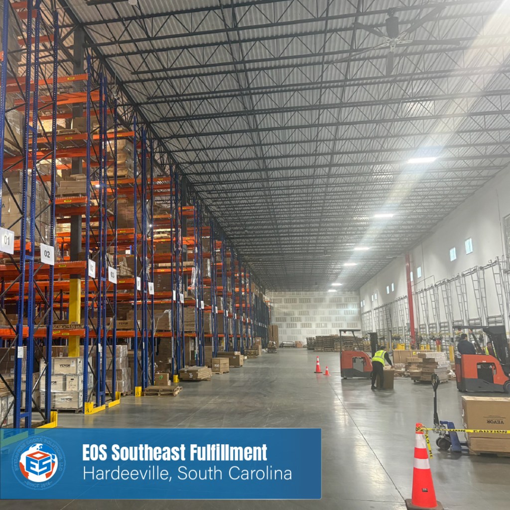 EOS workers operate a forklift and label inventory in the distance inside the large EOS Southeast Fulfillment Center in Hardeeville, South Carolina.